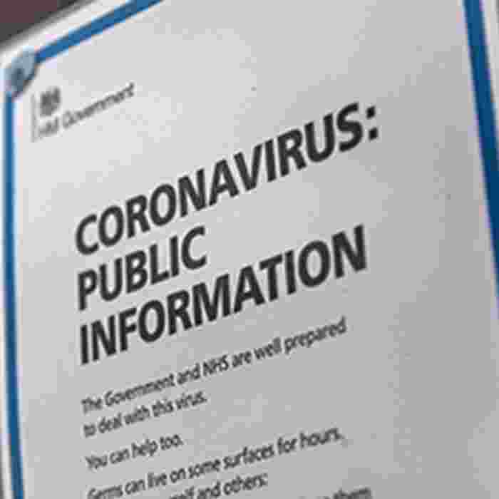 Sign on door with information on coronavirus