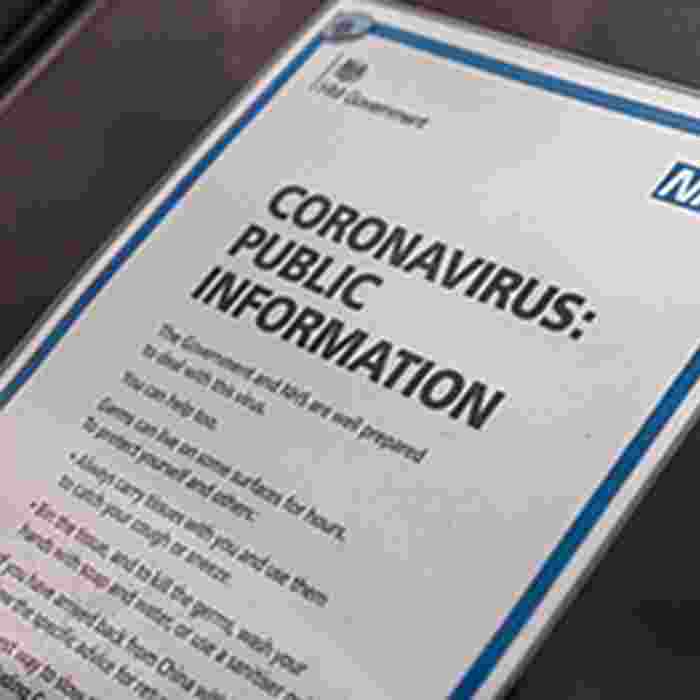 Sign on door with information on coronavirus