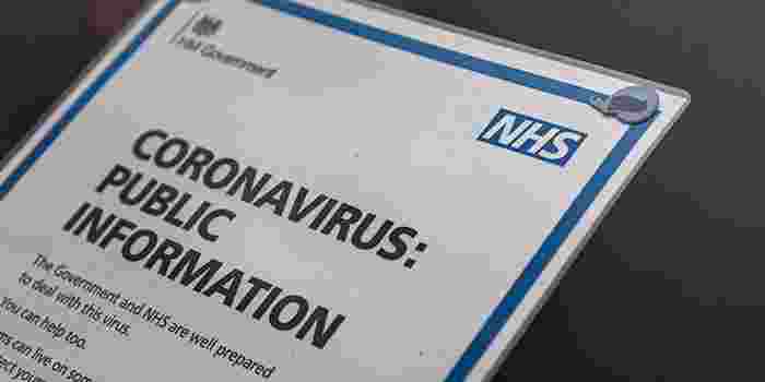 Sign on door about coronavirus